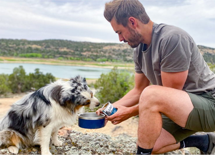 Man feeding his dog
